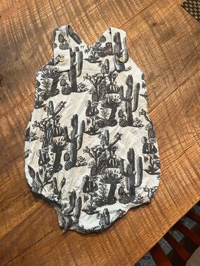 kate quinn bamboo blue and Black Cactus-Print Baby Romper